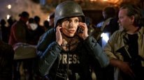 кадри з фільму Павільйон сміху / Американська репортерка